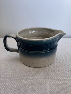 Stoneware creamer from the 'Blue Pacific' pattern by Wedgwood
